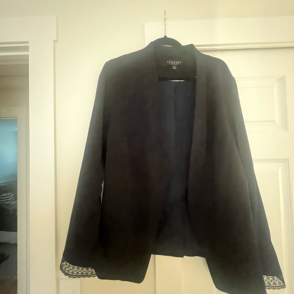 Any blue stretch blazer with lace trim on sleeve - never worn